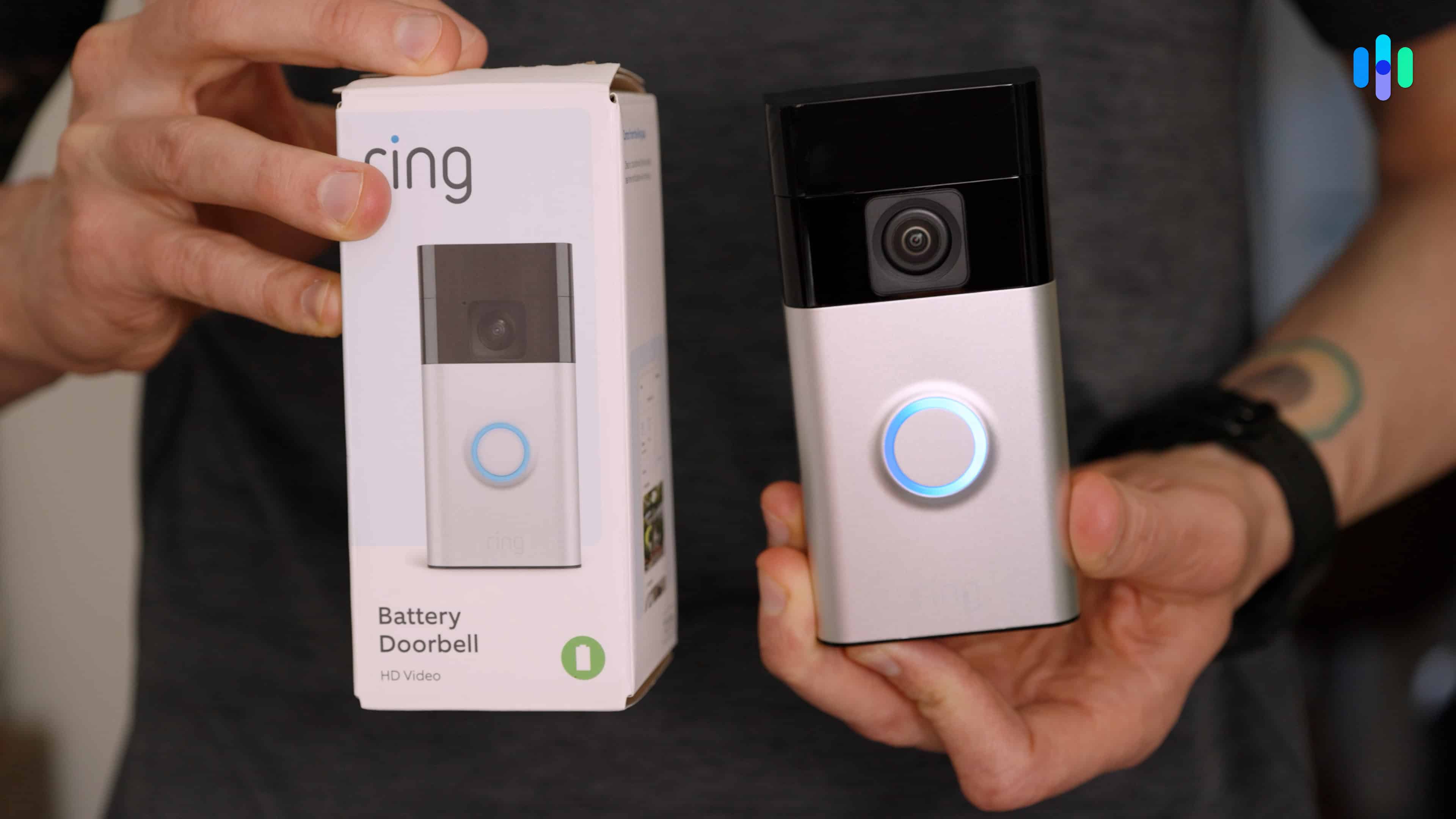 Holding the Ring Battery Doorbell and box Holding the Ring Battery Doorbell and box